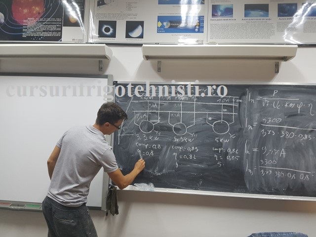 O poza cu Alex rezolvand o problema grad dificultate II ANRE .jpg